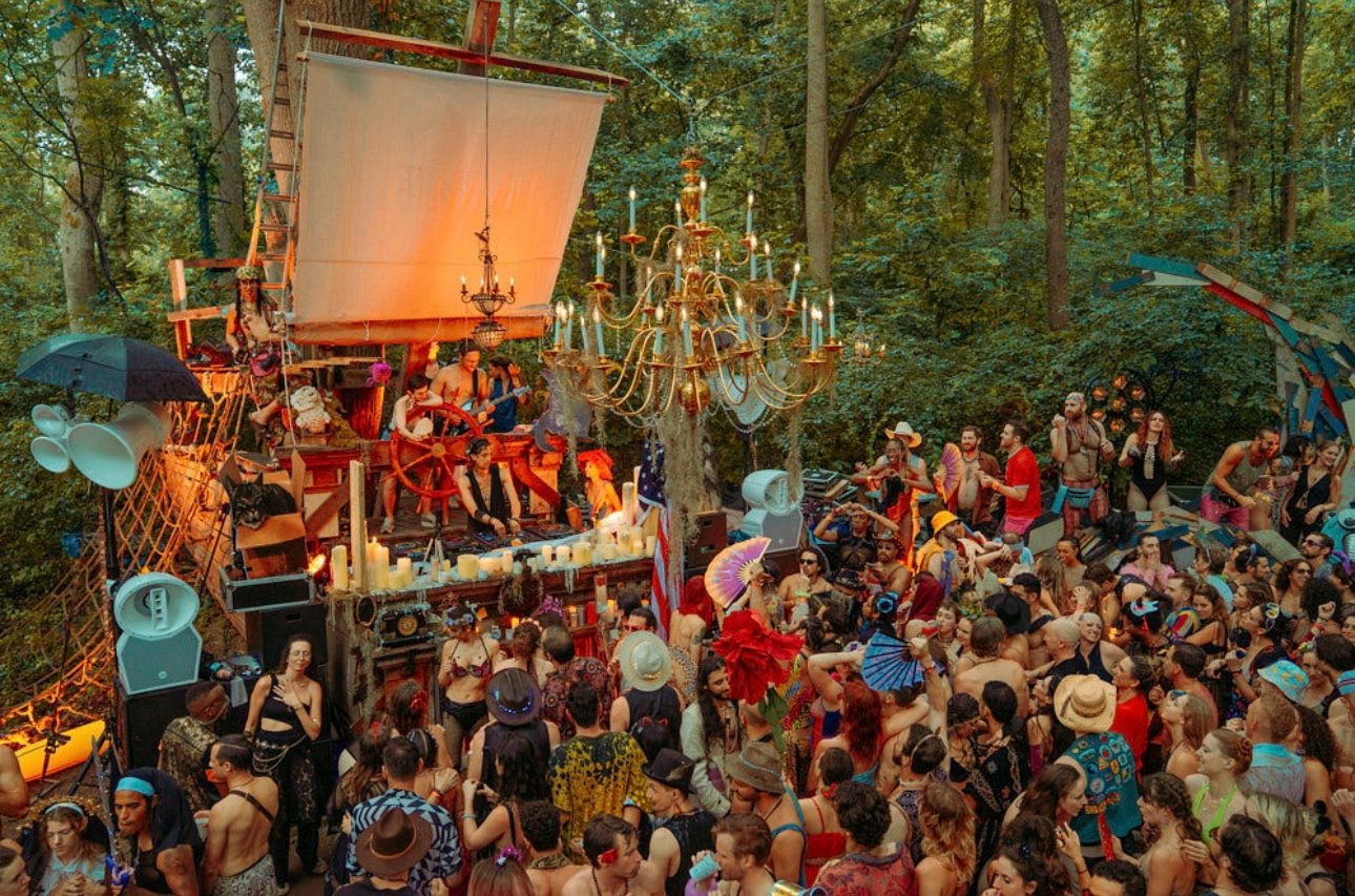 The full rig and a packed forest dancefloor at Calling All Magical People